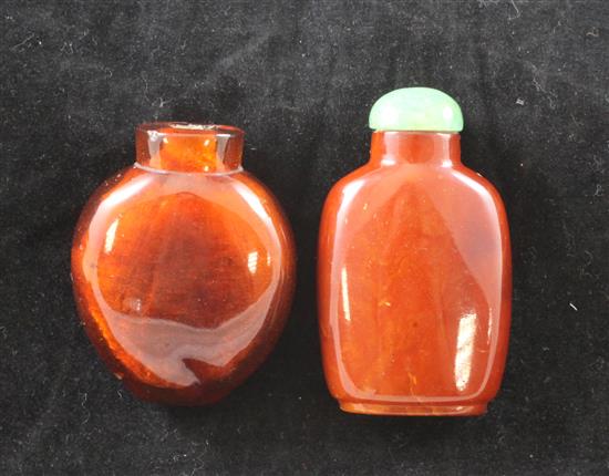 Two Chinese amber snuff bottles, 1800-1900, Richards no.s 55 and 141